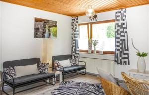 a living room with two chairs and a couch at Beautiful Apartment In Edertal With Wifi in Hemfurth-Edersee