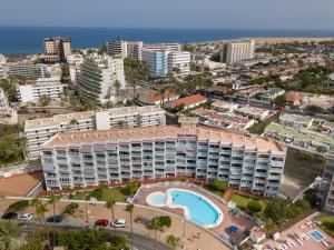 an aerial view of a building with a swimming pool at Modern & Elegant Loft in Playa del Ingles