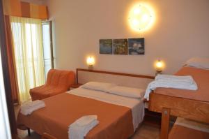 Postel nebo postele na pokoji v ubytování Hotel Ariston Riccione