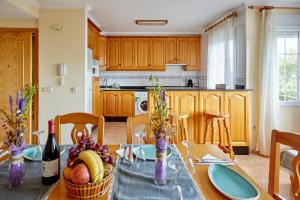 Kuchyň nebo kuchyňský kout v ubytování Apartamento Lorelay Familia
