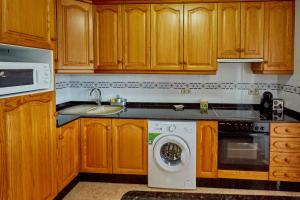 Kuchyň nebo kuchyňský kout v ubytování Apartamento Lorelay Familia + 2 fotografie