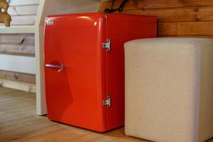 twee rode en witte koelkasten naast elkaar bij Dolce Vita Luxury Bungalows in Bodrum City
