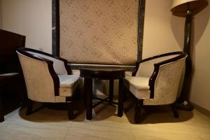 Posezení v ubytování Hotel Sai Inn