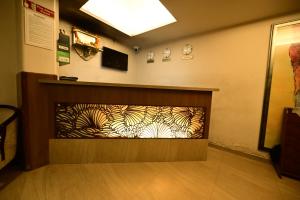 TV a/nebo společenská místnost v ubytování Hotel Sai Inn