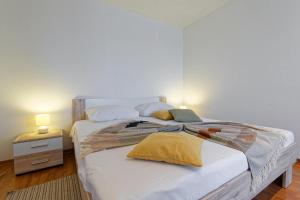 Postel nebo postele na pokoji v ubytování Holiday Home Brajdice by Rent Istria