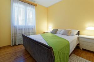 Postel nebo postele na pokoji v ubytování Holiday Home Brajdice by Rent Istria