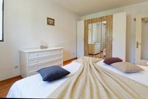 Postel nebo postele na pokoji v ubytování Holiday Home Brajdice by Rent Istria