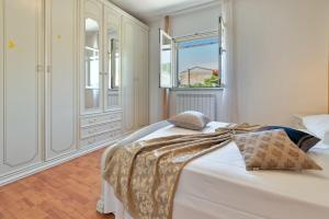 Postel nebo postele na pokoji v ubytování Holiday Home Brajdice by Rent Istria