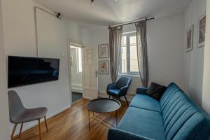 TV a/nebo společenská místnost v ubytování First Hostel