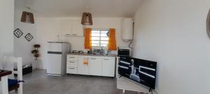 Kuchyň nebo kuchyňský kout v ubytování Casa Tiale - Chapadmalal , Campo y Olas-