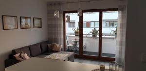 Posedenie v ubytovaní Apartament Reda