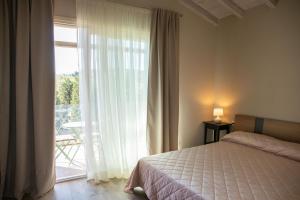 Posteľ alebo postele v izbe v ubytovaní Casa Bonelli
