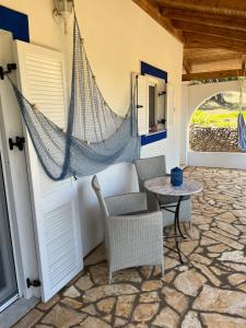 Posedenie v ubytovaní Cozy Corfu Bungalow 5 minutes to Aqualand