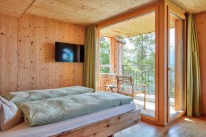 Postel nebo postele na pokoji v ubytování Hotel Waldhaus
