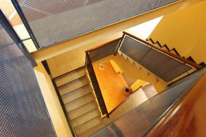 an overhead view of a staircase in a building at Hotel Marblau Tossa in Tossa de Mar