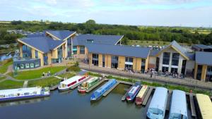 an aerial view of a marina with boats in the water at Entire House in Littleover Derby in Mickleover