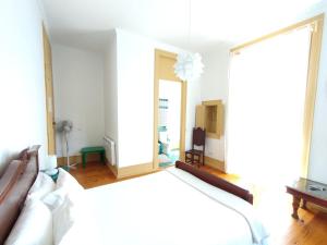 Postel nebo postele na pokoji v ubytování A Vianesa - Guest House + 37 fotografií