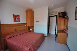 Voodi või voodid majutusasutuse Hotel Real toas +17 fotot