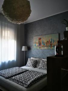 Кровать или кровати в номере Apartman Jovana 2