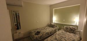 Postel nebo postele na pokoji v ubytování Vatos 2 bedroom apartment