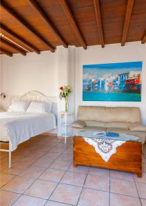 Cama ou camas em um quarto em Paradision Hotel