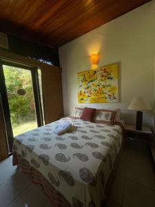 Ein Bett oder Betten in einem Zimmer der Unterkunft Bela Mare Buzios