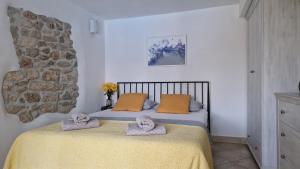 Postel nebo postele na pokoji v ubytování Apartman Karla