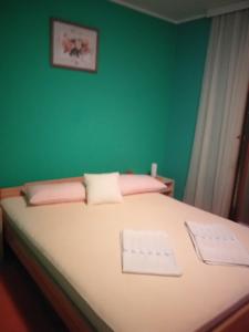 Postel nebo postele na pokoji v ubytování Vila Dalmatinka