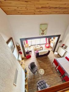 an overhead view of a living room with wooden ceilings at Maison - Les Angles T4 70m2 - Vue exceptionnelle in Les Angles