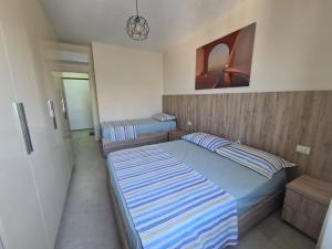 Katil atau katil-katil dalam bilik di Seascape apartment