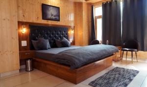 Postel nebo postele na pokoji v ubytování Odin Hostel Kasol