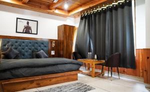 Posezení v ubytování Odin Hostel Kasol