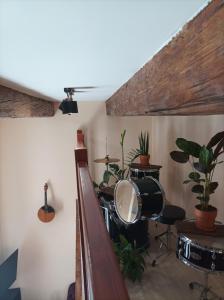 a room with a drum set in a room at Chorni vivtsy in Chernivtsi