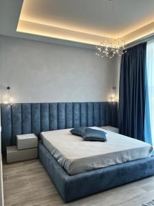 Un pat sau paturi într-o cameră la Notti Saracene Rooms