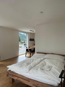 Ένα ή περισσότερα κρεβάτια σε δωμάτιο στο The R Apartment Engelberg, KLIMA, NEU, Balkon, Parking