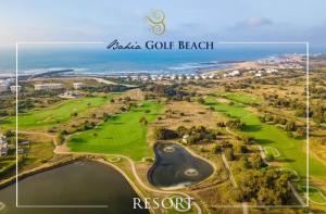 an aerial view of the golf course at the ocean resort at Bahia golf beach in Bouznika