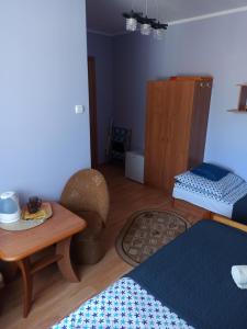 Postel nebo postele na pokoji v ubytování Pokoje Goscinne Bartosz