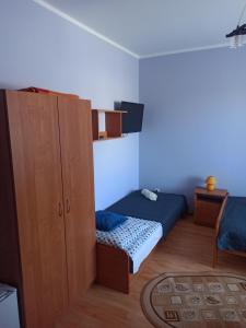Postel nebo postele na pokoji v ubytování Pokoje Goscinne Bartosz