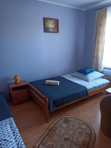 Postel nebo postele na pokoji v ubytování Pokoje Goscinne Bartosz