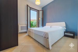 Ένα ή περισσότερα κρεβάτια σε δωμάτιο στο Villa Seaside - Beach Retreat with jacuzzi +50 φωτογραφίες