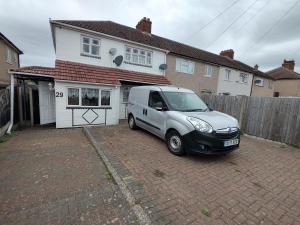 a white van parked in front of a house at 3 bedroom house in Grays Thurrock