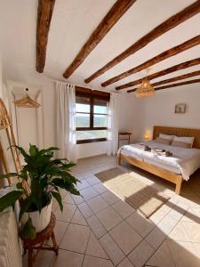 Postel nebo postele na pokoji v ubytování B&B Mas del Pi