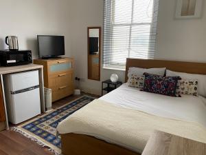 Postel nebo postele na pokoji v ubytování HAGGERSTON + 53 fotografií