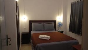 Postel nebo postele na pokoji v ubytování Hotel Arda Bali + 37 fotografií