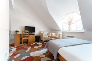 Llit o llits en una habitació de Hermannuse Maja