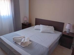 Postel nebo postele na pokoji v ubytování Stef Lux Home of Kriopigi