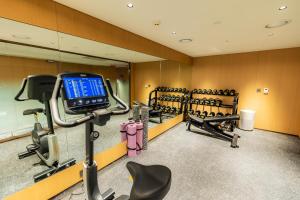 a fitness room with a gym with cardio equipment at Incheon Airport Transit Hotel Terminal 1 in Incheon