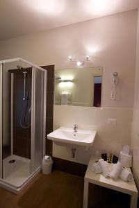 Koupelna v ubytování Hotel Leon D'Oro