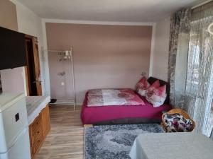 Łóżko lub łóżka w pokoju w obiekcie Ferienhaus Burgblick