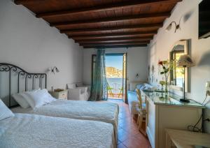 Cama ou camas em um quarto em Paradision Hotel